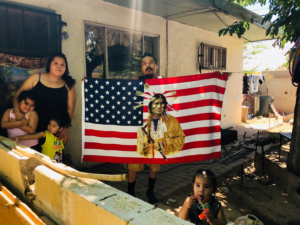 A family responds to the car protest in Albuquerque. Liberation photo. 